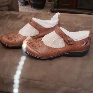 brown leather flats